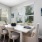 a dining room with a table and chairs
