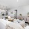 Bright living room with white furniture at Element Barclay Station apartment rentals in Wilmington, NC